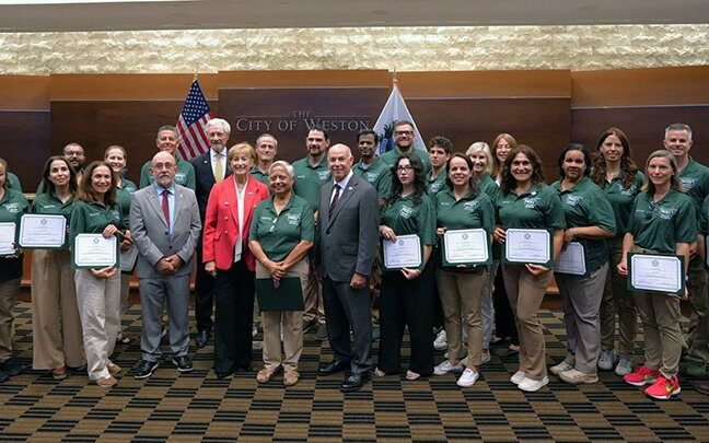 Weston CERT graduates with city and fire officials at the September 28, 2026 City Commission meeting. Photo: City of Weston